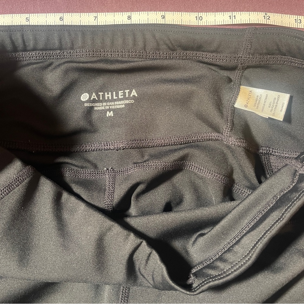 Athleta Contender Tight Leggings in black - Size Medium Zipper Pockets - Picture 4 of 7
